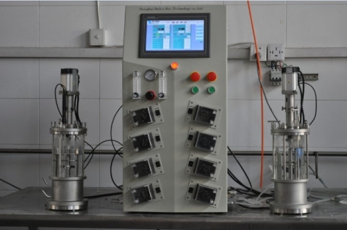 two conjoined  glass fermenter|bioreactor  (desktop)